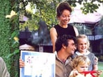 Peter Falk on Columbo (L) and Peter Falk with his wife and daughters on the set of Columbo. 