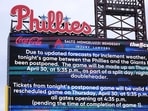Announcement of postponement of the Philadelphia Phillies vs \San Francisco Giants is displayed on the large scoreboard at Citizens Bank Park