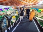 Prime Minister Narendra Modi and UP chief minister Yogi Adityanath witness the sand art at the inauguration of the Ganga Expressway, in Hardoi on Wednesday. (Narendra Modi Photo Gallery/ANI Photo)