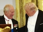 US President Donald Trump and Britain's King Charles III smile as they talk during a State Dinner in the East Room of the White House in Washington, DC, on April 28.