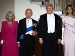 US President Donald Trump and First Lady Melania Trump pose with Britain's King Charles III and Queen Camilla ahead of a State Dinner in the East Room of the White House in Washington, DC, on April 28, 2026. (Photo by HENRY NICHOLLS / AFP)