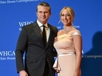 US Secretary of Defense Pete Hegseth (L) and wife Jennifer Rauchet attend the White House Correspondents' dinner at the Washington Hilton in Washington, DC, on April 25, 2026. US President Donald Trump is attending the annual gala of the political press for the first time while in office. (Photo by Alex WROBLEWSKI / AFP)