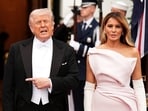 US President Donald Trump and first lady Melania Trump receive Britain's King Charles and Queen Camilla as they arrive for a state dinner at the White House in Washington, DC.