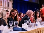 U.S. President Donald Trump, first lady Melania Trump, White House Press Secretary Karoline Leavitt and CBS News senior White House correspondent Weijia Jiang attend the annual White House Correspondents' Association dinner in Washington, D.C., U.S., April 25, 2026. REUTERS/Jonathan Ernst