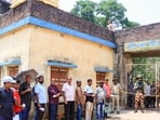 Voters queue up as they wait to cast their votes at a polling station in Howrah on Wednesday. (@ECISVEEP/ANI) Voters queue up as they wait to cast their votes at a polling station in Howrah on Wednesday. (@ECISVEEP/ANI)