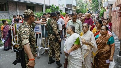 Voters queue outside a polling station to cast their vote during the second phase of West Bengal Assembly elections 2026, in Kolkata on Wednesday. (ANI) Voters queue outside a polling station to cast their vote during the second phase of West Bengal Assembly elections 2026, in Kolkata on Wednesday. (ANI)