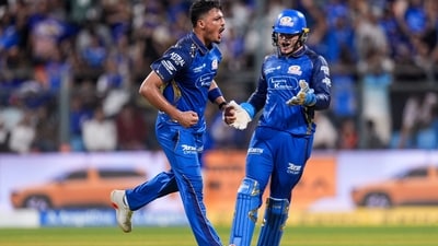 AM Ghazanfar brought Mumbai back into the game after a roaring start from Abhishek and Head. He picked up two wickets in two balls, including the dismissal of Ishan Kishan for a golden duck. Hardik Pandya struck in the next over removing Abhishek. (PTI) AM Ghazanfar brought Mumbai back into the game after a roaring start from Abhishek and Head. He picked up two wickets in two balls, including the dismissal of Ishan Kishan for a golden duck. Hardik Pandya struck in the next over removing Abhishek. (PTI)