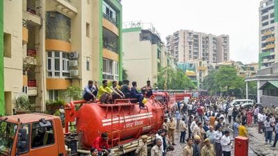 The fire at Gaur Green Avenue, a residential complex with 447 flats, left at least eight apartments completely gutted and four to six others damaged, according to officials. (Sakib Ali/HT Photo) The fire at Gaur Green Avenue, a residential complex with 447 flats, left at least eight apartments completely gutted and four to six others damaged, according to officials. (Sakib Ali/HT Photo)