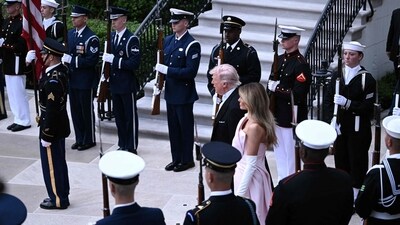 US President Donald Trump and First Lady Melania Trump wait for the arrival of Britain's King Charles III and Queen Camilla for a State Dinner in the East Room of the White House in Washington, DC, on April 28, 2026. (Photo by Brendan SMIALOWSKI / AFP) (AFP) US President Donald Trump and First Lady Melania Trump wait for the arrival of Britain's King Charles III and Queen Camilla for a State Dinner in the East Room of the White House in Washington, DC, on April 28, 2026. (Photo by Brendan SMIALOWSKI / AFP) (AFP)