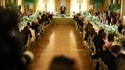 Guests listen to US President Donald Trump speak during a State Dinner in honor of Britain's King Charles III and Queen Camilla in the East Room of the White House in Washington, DC, on April 28, 2026. (Photo by HENRY NICHOLLS / AFP) (AFP) Guests listen to US President Donald Trump speak during a State Dinner in honor of Britain's King Charles III and Queen Camilla in the East Room of the White House in Washington, DC, on April 28, 2026. (Photo by HENRY NICHOLLS / AFP) (AFP)