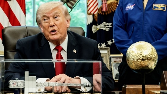 US President Donald Trump takes questions from the media during an event with Artemis II astronauts in the Oval Office at the White House