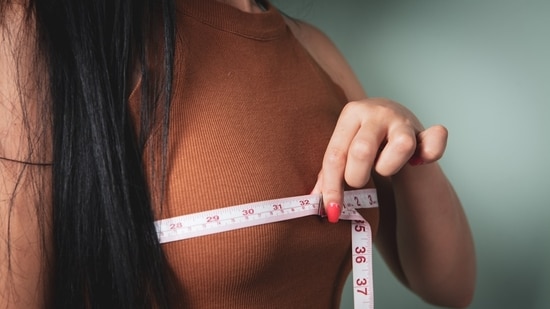 Can breast reductions help with chronic back pain? Read more to find out! (Unsplash)