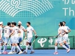 HANGZHOU, CHINA - OCTOBER 06: Harmanpreet Singh #13 of India celebrate a goal with teammate during the Asian Games Men's Final Hockey event match between Japan and India at Gongshu Canal Sports Park Gymnasium on October 06, 2023 in Hangzhou, China. (Photo by Lintao Zhang/Getty Images) (Getty Images)