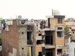 MCD demolishes the illegal portion of the residence belonging to the accused in the Tarun Kumar murder case in Uttam Nagar, in New Delhi on Thursday. (ANI Video Grab) MCD demolishes the illegal portion of the residence belonging to the accused in the Tarun Kumar murder case in Uttam Nagar, in New Delhi on Thursday. (ANI Video Grab)
