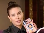 Priyanka Chopra flaunts her love for Malti and Nick Jonas that she carries with her in her bag.