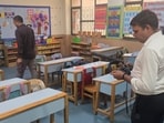 Students evacuated as police, bomb squads sweep campuses; cyber teams probe origin of emails amid rise in similar threats, security tightened citywide. (HT) Students evacuated as police, bomb squads sweep campuses; cyber teams probe origin of emails amid rise in similar threats, security tightened citywide. (HT)