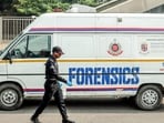 A national security guard (NSG) personnel walks past a forensic van that stands stationed near the exit of the Lal Qila metro station, where the explosion on Monday claimed at least 10 lives, and injured several others.(Representative Image/Naveen Sharma/ANI)