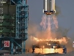 A Chinese Long March-2F carrier rocket lifts off.