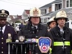 An explosion in Queens sparked a five-alarm fire, injuring ten, including seven police officers. Responding to a dispute, officers faced the blast while trying to enter a residence. Firefighters contained the fire, and investigations are underway regarding the explosion and the initial altercation.