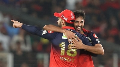Bhuvneshwar Kumar remains absolutely sensational for RCB – bowling all his overs up front, he finished with 3 wickets, removing both openers before adding Jos Buttler with a searing leg stump yorker. At the age of 36, at the peak of his powers. (REUTERS)