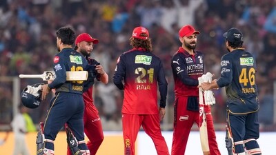 Gujarat Titans chased down 156 with plenty of time to spare to gain a couple of points on the playoff spots. RCB spurn a chance to go to the top of the table, as the batting collapsed through the middle overs, not giving the bowlers enough to defend. (PTI) Gujarat Titans chased down 156 with plenty of time to spare to gain a couple of points on the playoff spots. RCB spurn a chance to go to the top of the table, as the batting collapsed through the middle overs, not giving the bowlers enough to defend. (PTI)