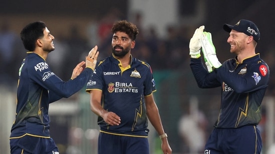 GT vs RCB LIVE Score: Jos Buttler, Shubman Gill, and Mohammed Siraj celebrate during GT's win.