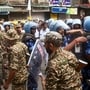 Kolkata, Apr 29 (ANI): CAPF personnel and police disperse a mob at Ward No. 77 under Bhabanipur Assembly constituency during the second phase of the West Bengal Assembly elections, in Kolkata on Wednesday. (ANI Photo)(Saikat paul)
