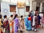Voters wait in a queue at polling booths in Baharampur and Lalbag areas of Murshidabad during the West Bengal Assembly Elections 2026, in Murshidabad on Thursday.