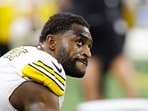 Pittsburgh Steelers' DK Metcalf sits on the bench during the second half of an NFL football game against the Detroit Lions