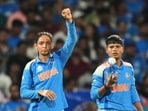 India's captain Harmanpreet Kaur (L) with Kranti Goud during the ICC Women's Cricket World Cup in Navi Mumbai, India, Sunday. (AP)