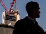 A banner with the JP Morgan Asset Management logo on the redevelopment site of 65 Gresham Street in London