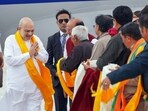 Union home minister Amit Shah receives a warm welcome by Ladakh LG Vinai Kumar Saxena and other dignitaries upon his arrival at the airport, in Leh on Thursday. (ANI)