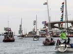 Boats of a new humanitarian flotilla bound for the Gaza Strip make a symbolic leave from Barcelona's Port Vell.