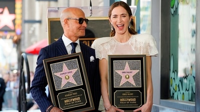 Emily Blunt and Stanley Tucci showed off their respective plaques representing the Hollywood Walk of Fame honour. Emily looked towards the camera with an excited expression as Stanley beamed towards her. (AP) Emily Blunt and Stanley Tucci showed off their respective plaques representing the Hollywood Walk of Fame honour. Emily looked towards the camera with an excited expression as Stanley beamed towards her. (AP)