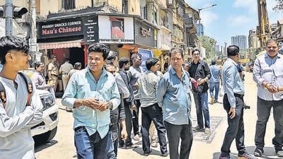 Mumbai, India. May 01, 2026 - Residents of Haji Noorani building gathered outside as MMRDA and police arrived to cut power and water supply, because the building is within the alignment of the new Elphinstone Bridge and Worli Sewri Connector project.Mumbai, India. May 01, 2026. (Photo by Raju Shinde/HT Photo) (Raju Shinde) Mumbai, India. May 01, 2026 - Residents of Haji Noorani building gathered outside as MMRDA and police arrived to cut power and water supply, because the building is within the alignment of the new Elphinstone Bridge and Worli Sewri Connector project.Mumbai, India. May 01, 2026. (Photo by Raju Shinde/HT Photo) (Raju Shinde)