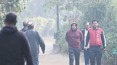 New Delhi, India - Nov. 17, 2025: People on morning walk during air quality remains in 'very poor' category, at Lodhi Garden in New Delhi, India, on Monday, November 17, 2025. (Photo by Arvind Yadav/ Hindustan Times) (Hindustan Times)