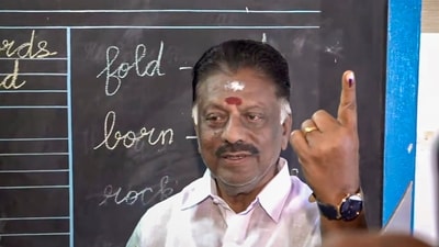 Former Tamil Nadu Chief Minister and DMK candidate for Bodinayakkanur constituency, O Panneerselvam, shows his ink-marked finger after casting his vote for the state Assembly elections, at a polling station, in Theni district. (PTI) Former Tamil Nadu Chief Minister and DMK candidate for Bodinayakkanur constituency, O Panneerselvam, shows his ink-marked finger after casting his vote for the state Assembly elections, at a polling station, in Theni district. (PTI)