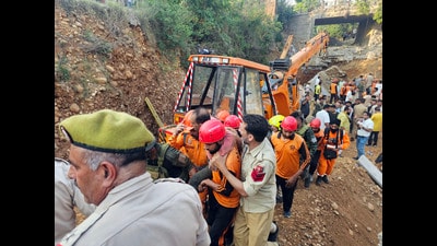 Rescue operations underway after a portion of an under-construction bridge collapsed in the Bantalab Thathar area, in Jammu on Friday. (ANI)