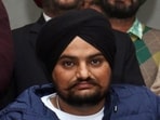 A total of 34 persons, including gangsters Lawrence Bishnoi, Goldy Brar and Jaggu Bhagwanpuria, were nominated as accused in a series of chargesheets. (HT) A total of 34 persons, including gangsters Lawrence Bishnoi, Goldy Brar and Jaggu Bhagwanpuria, were nominated as accused in a series of chargesheets. (HT)