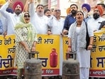 Aam Aadmi Party workers protesting in Ludhiana on Saturday. (HT Photo)