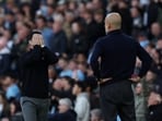 Arsenal coach Mikel Arteta (left) and Manchester City manager Pep Guardiola during their recent Premier League clash.