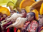Buddhist monks blow ceremonial conch shells during a special prayer ceremony on the occasion of Buddha Purnima at Dorje Drak Monastery, in Shimla, on Friday. (PTI)