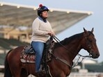 Cherie DeVaux, trainer of Golden Tempo, looks on during morning workouts ahead of the running of the 152nd Kentucky Derby at Churchill Downs