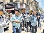 Mumbai, India. May 01, 2026 - Residents of Haji Noorani building gathered outside as MMRDA and police arrived to cut power and water supply, because the building is within the alignment of the new Elphinstone Bridge and Worli Sewri Connector project.Mumbai, India. May 01, 2026. (Photo by Raju Shinde/HT Photo) (Raju Shinde) Mumbai, India. May 01, 2026 - Residents of Haji Noorani building gathered outside as MMRDA and police arrived to cut power and water supply, because the building is within the alignment of the new Elphinstone Bridge and Worli Sewri Connector project.Mumbai, India. May 01, 2026. (Photo by Raju Shinde/HT Photo) (Raju Shinde)