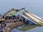 NDRF and other rescue personnel recover the cruise boat that capsized in Bargi Dam due to a sudden storm in Jabalpur district of Madhya Pradesh on Thursday. (PTI) NDRF and other rescue personnel recover the cruise boat that capsized in Bargi Dam due to a sudden storm in Jabalpur district of Madhya Pradesh on Thursday. (PTI)