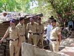 Police at the spot where a 4-year-old girl was allegedly sexually assaulted and murdered by a 65-year-old man in a village, in Pune on Saturday. (ANI Video Grab)