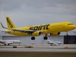 A Spirit Airlines flight arrives at Fort Lauderdale - Hollywood International Airport, in Fort Lauderdale, Florida.