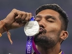 Tejaswin Shankar poses with his silver medal at the 2023 Asian Games in Hangzhou. (PTI) Tejaswin Shankar poses with his silver medal at the 2023 Asian Games in Hangzhou. (PTI)