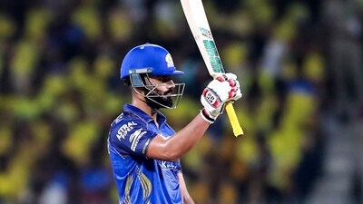 Naman Dhir continues to enjoy life at number three for MI, adding another half-century. He was undone right before he could begin accelerating, undone by a great Sarfaraz Khan catch. (ANI Picture Service)