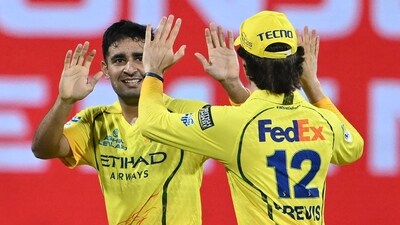 Anshul Kamboj has been CSK's go-to bowler for wickets and was back at it against against MI, finishing with three wickets. He joins Bhuvneshwar Kumar right at the top of the Purple Cap leaderboard. (AFP)